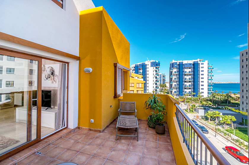 Penthouse apartment with solarium in Punta Prima